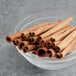 A bowl of McCormick Culinary cinnamon sticks.