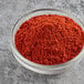 A bowl of McCormick Culinary Smoked Paprika.