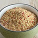 A white bowl of McCormick Culinary Guacamole and More seasoning.