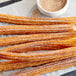 McCormick Culinary Cinnamon Sugar on churros with sugar.