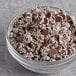 A bowl of mini white chocolate nonpareils.