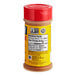 A bottle of Old Bay Seasoning with a red lid.