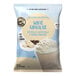 A close-up of a white Big Train White Chocolate Blended Ice Coffee Mix bag.