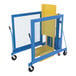 A blue and yellow metal Vestil trash can dumper with a metal frame.