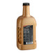 A brown liquid bottle with a black label for DaVinci Gourmet Sugar Free Chocolate Flavoring Sauce.