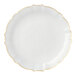 A white Posh Setting plastic plate with gold trim.