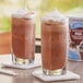 Two glasses of Big Train Low Carb Mocha Blended Ice Coffee.