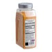 A plastic container of brown McCormick Culinary Korean BBQ Gochujang Style Seasoning.