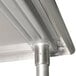 A close-up of a stainless steel corner edge.