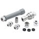 A group of silver metal T&S plumbing nuts and fittings.
