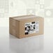 A white cardboard box with a black and white Adourne label.