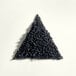 A triangle of Adourne Black Sprinkles.