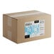 A large cardboard box labeled as containing 10 pounds of Adourne Light Blue Sprinkles.