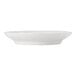 A white round porcelain pasta bowl.