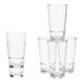 A group of Tossware clear plastic mixing glasses stacked together.