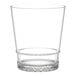 A Tossware Reserve stackable clear plastic rocks glass with a diamond-cut base.