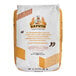 An 11 lb bag of Caputo Semola Durum Semolina flour with white and orange packaging and a picture of a chef.