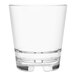 A clear Tossware Rocks glass with a white rim.