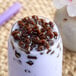 A glass of milk with brown Bossen Fast Cook Big Tapioca Boba.