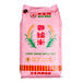 A 50-pound bag of Rice King Long Grain Sweet Thai Rice in pink packaging.