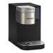 A black and silver Keurig commercial single serve coffee maker with a silver lid.