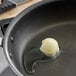 Beef tallow in a frying pan.