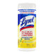 A close up of a white plastic container of Lysol Lemon and Lime Blossom scented disinfecting wipes with a yellow label.
