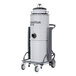 A white Nilfisk steel wet/dry vacuum cylinder with black wheels and handle.