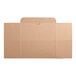 A brown cardboard Baker's Lane cupcake box with a lid.