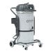 A grey and black Nilfisk VHS120N1 wet/dry vacuum cleaner with wheels.