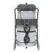 A Nilfisk industrial wet/dry vacuum on a cart with a cord.