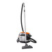 A Nilfisk GD930 PRO industrial vacuum cleaner with a black and orange handle.