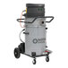 A grey and black Nilfisk wet/dry vacuum cleaner with wheels.