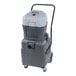 A grey and black Nilfisk Eliminator Pro II wet / dry vacuum cleaner on wheels.