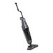 A Nilfisk walk-behind floor scrubber with a handle.