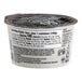 A container of So Delicious Raspberry Coconut Milk Yogurt Alternative with a label.