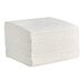 A stack of white Choice White Linen-Feel dinner napkins.