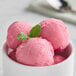 A bowl of Acai Roots strawberry cream sorbet.