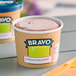 A close-up of a Bravo Gelato chocolate gelato cup.