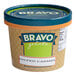 A container of Bravo Salted Caramel Gelato on a table.