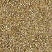 A close-up of a pile of crushed white and brown seeds.
