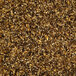 A close up of a pile of brown and yellow grains of Briess Crushed Caramel Malt.