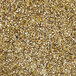 A close-up of a pile of crushed brown seeds.