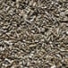 A pile of brown and white Briess crushed rye malt.