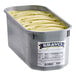 A yellow and green Bravo Gelato tub of Pistachio Gelato.