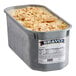 A white tub of Bravo Banana Pudding Gelato.