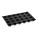 A black Sasa Demarle Flexipan Short Cylinder Mold tray with holes.
