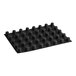A black rubber Sasa Demarle silicone mat with many round cavities.