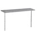 A silver stainless steel table with an Advance Tabco stainless steel shelf mounted on the middle.