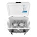 A white stainless steel Coldbreak jockey box with two metal coils inside.